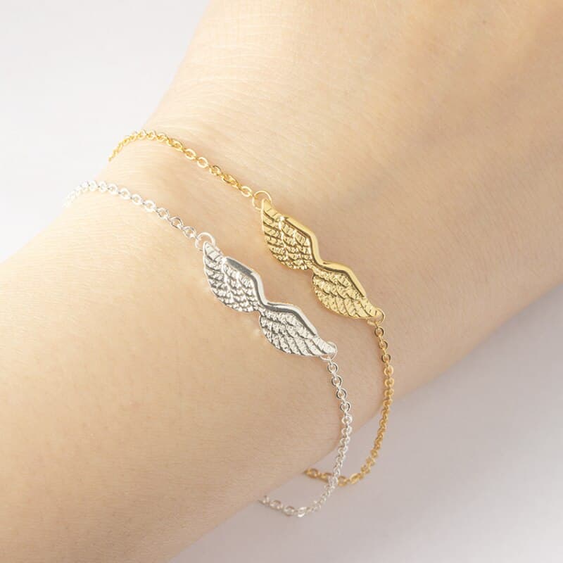Pulseira feminina com pingente de asa de anjo dourada 4