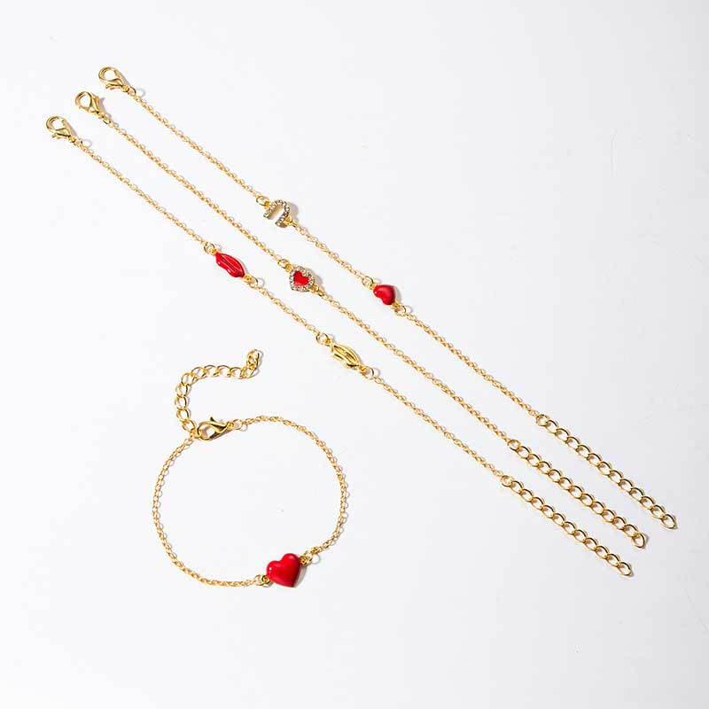 Pulseira feminina com lábios dourados em formato de amor