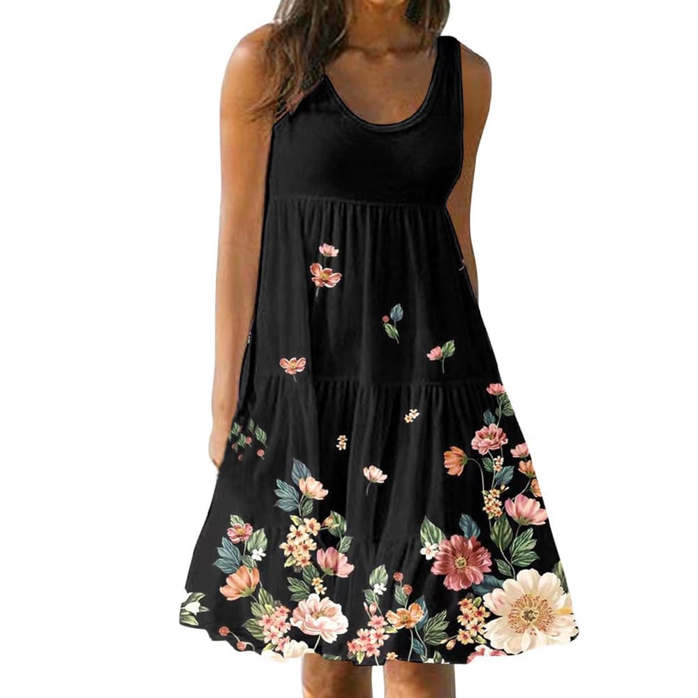 Vestido feminino com estampa floral, gola redonda, sem mangas, modelagem solta, ideal para festas e praia. 2