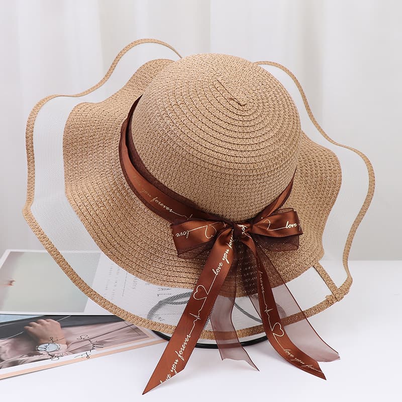 Chapéu de praia feminino com aba larga e proteção solar para atividades ao ar livre. 4