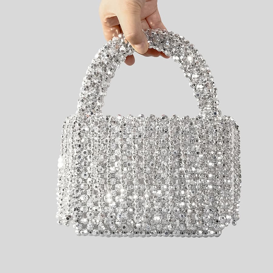 Bolsa de acrílico com franjas