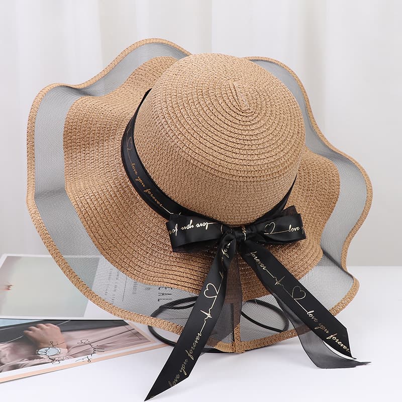 Chapéu de praia feminino com aba larga e proteção solar para atividades ao ar livre. 2