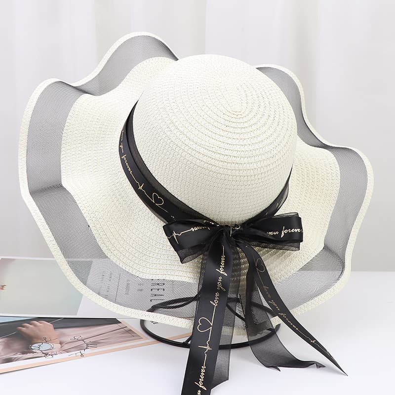 Chapéu de praia feminino com aba larga e proteção solar para atividades ao ar livre. 7