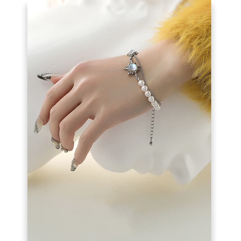 Pulseira de pérolas com costura para mulheres 11