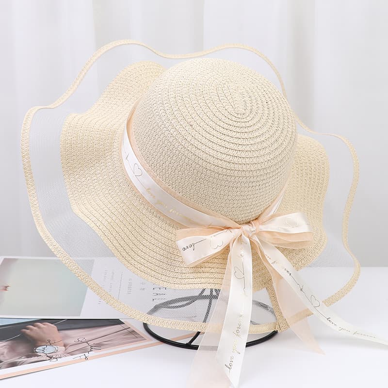 Chapéu de praia feminino com aba larga e proteção solar para atividades ao ar livre. 3