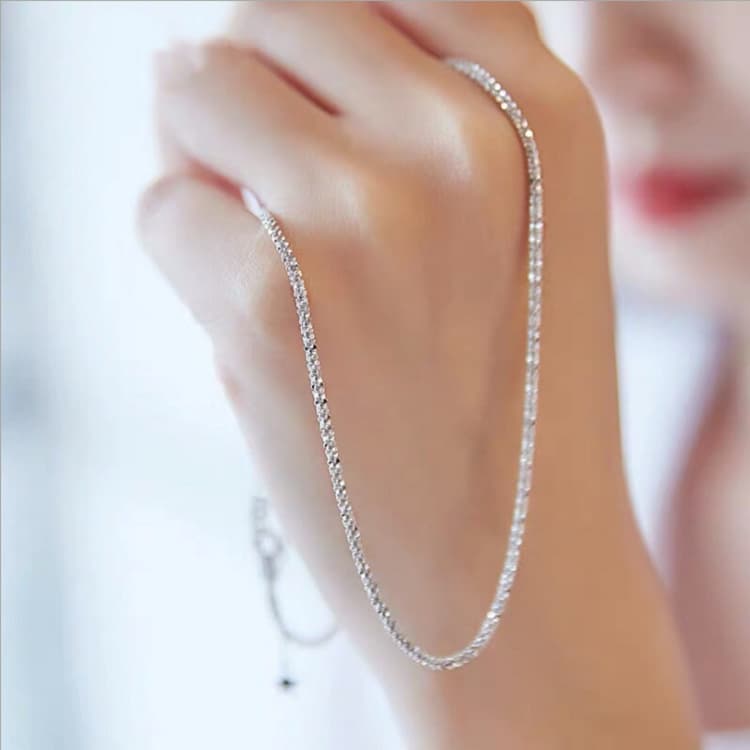 Colar feminino em prata de lei 990 com pingente de estrela. 5