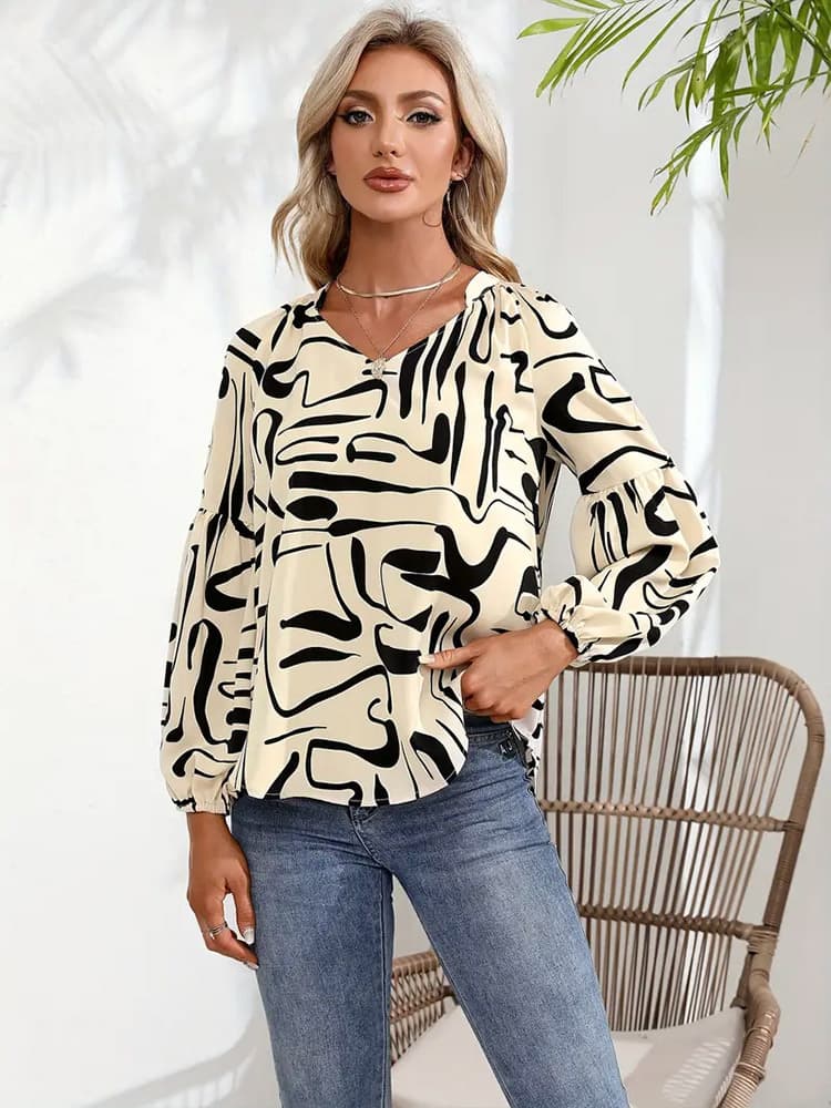 Blusa feminina folgada com estampa irregular 4