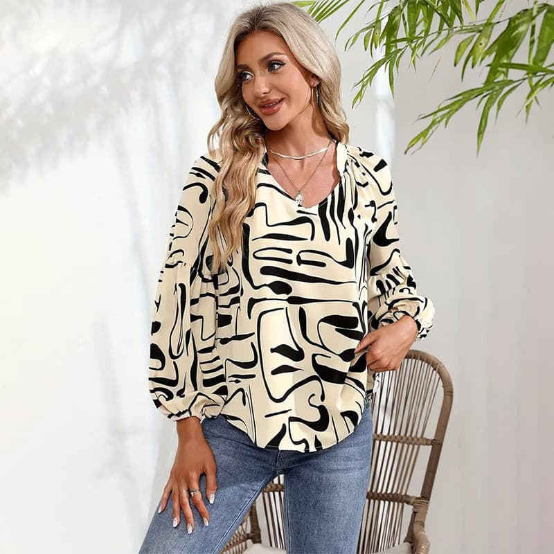 Blusa feminina folgada com estampa irregular 6