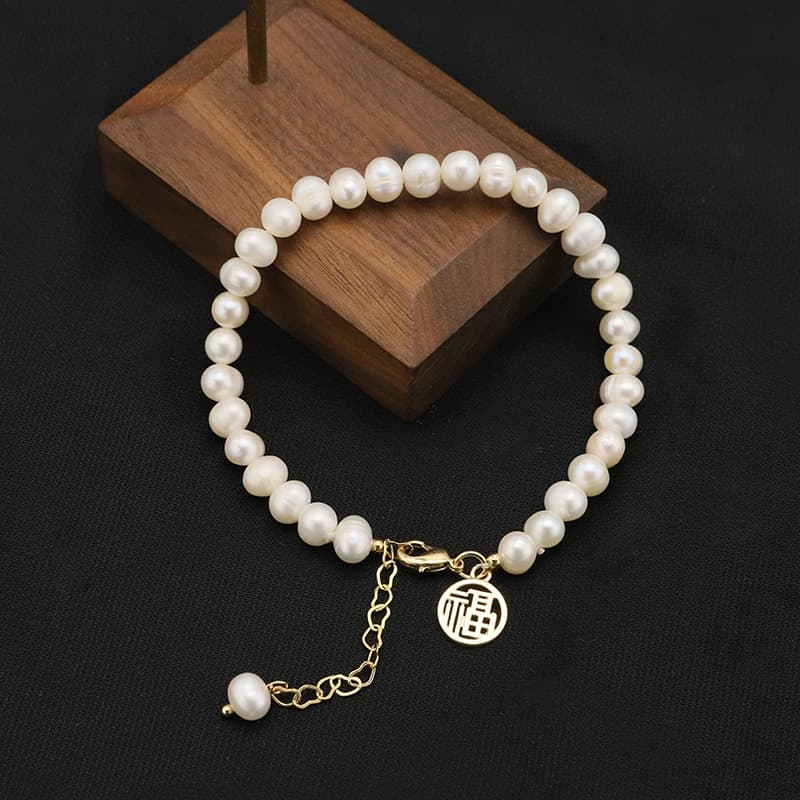 Pulseira retrô feminina com pérolas naturais