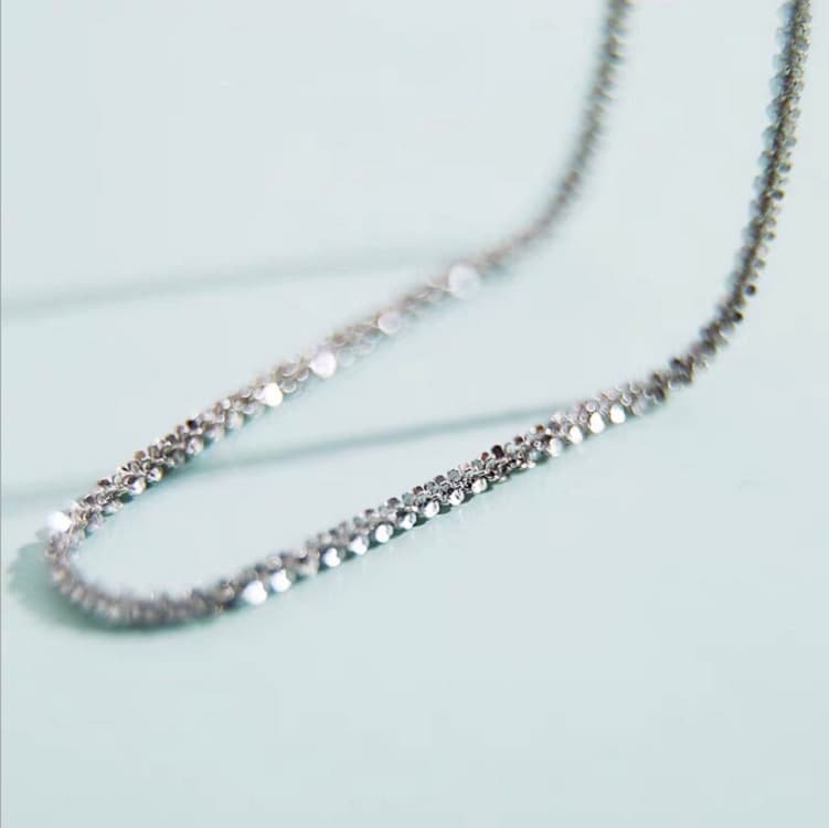 Colar feminino em prata de lei 990 com pingente de estrela. 2