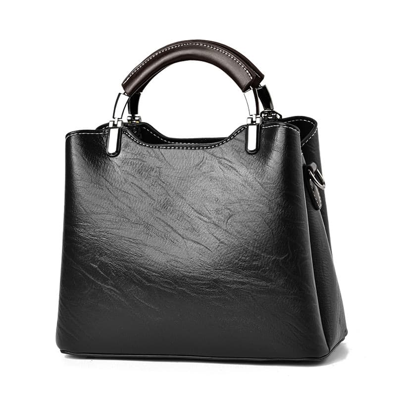 Bolsa feminina pequena, simples e retrô.